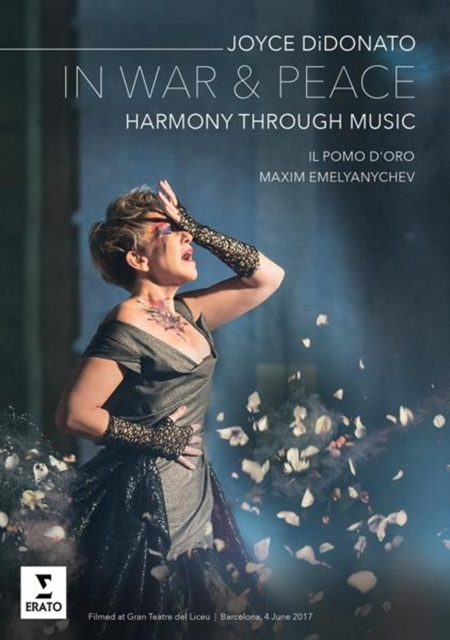 Okładka książki: Joyce DiDonato w sukni z tytułem plakatu. 'In War & Peace, Harmony Through Music'.