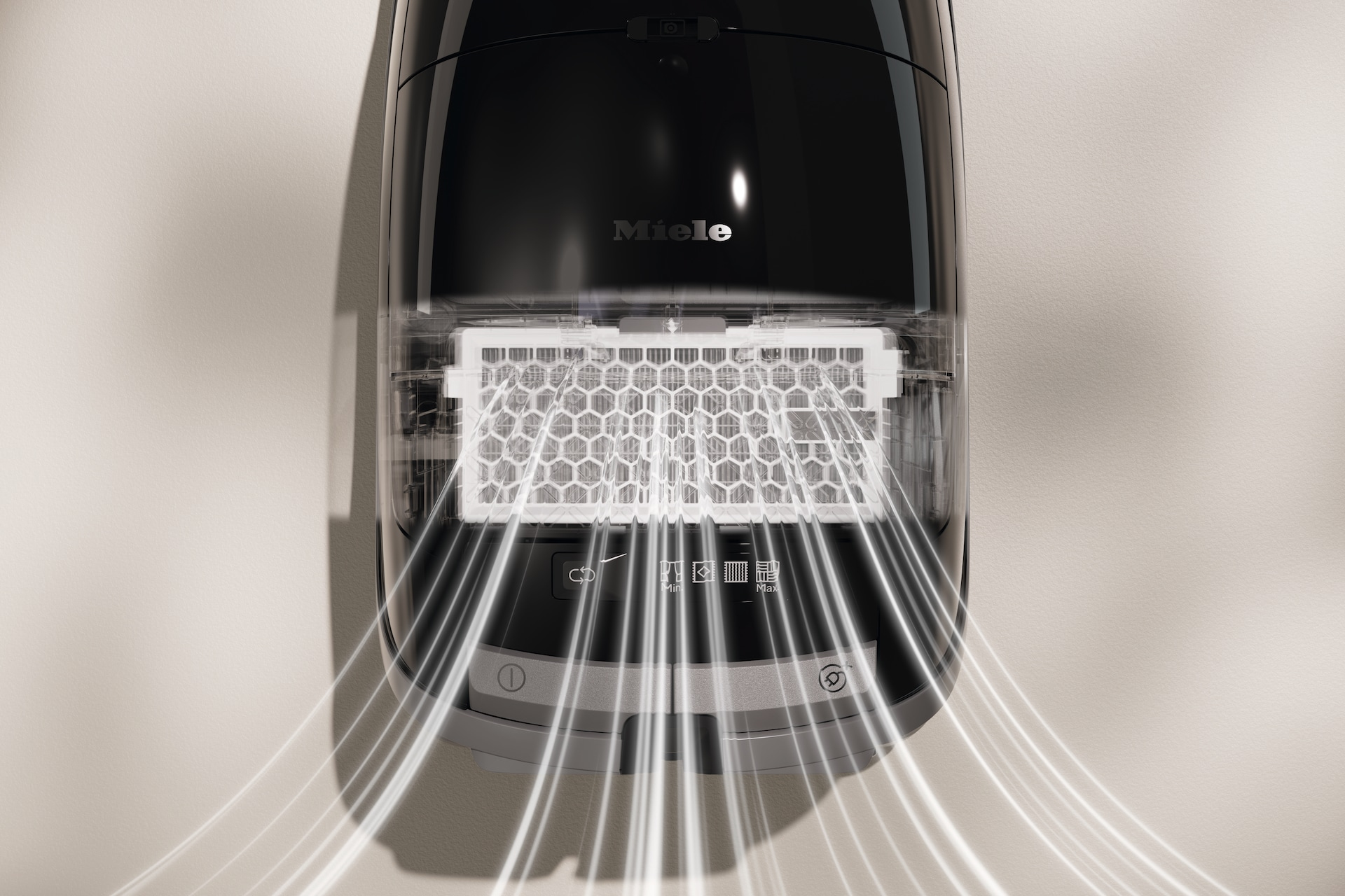 Odkurzacz z białym filtrem powietrza i liniami przepływu powietrza. Odkurzacz jest na ścianie.