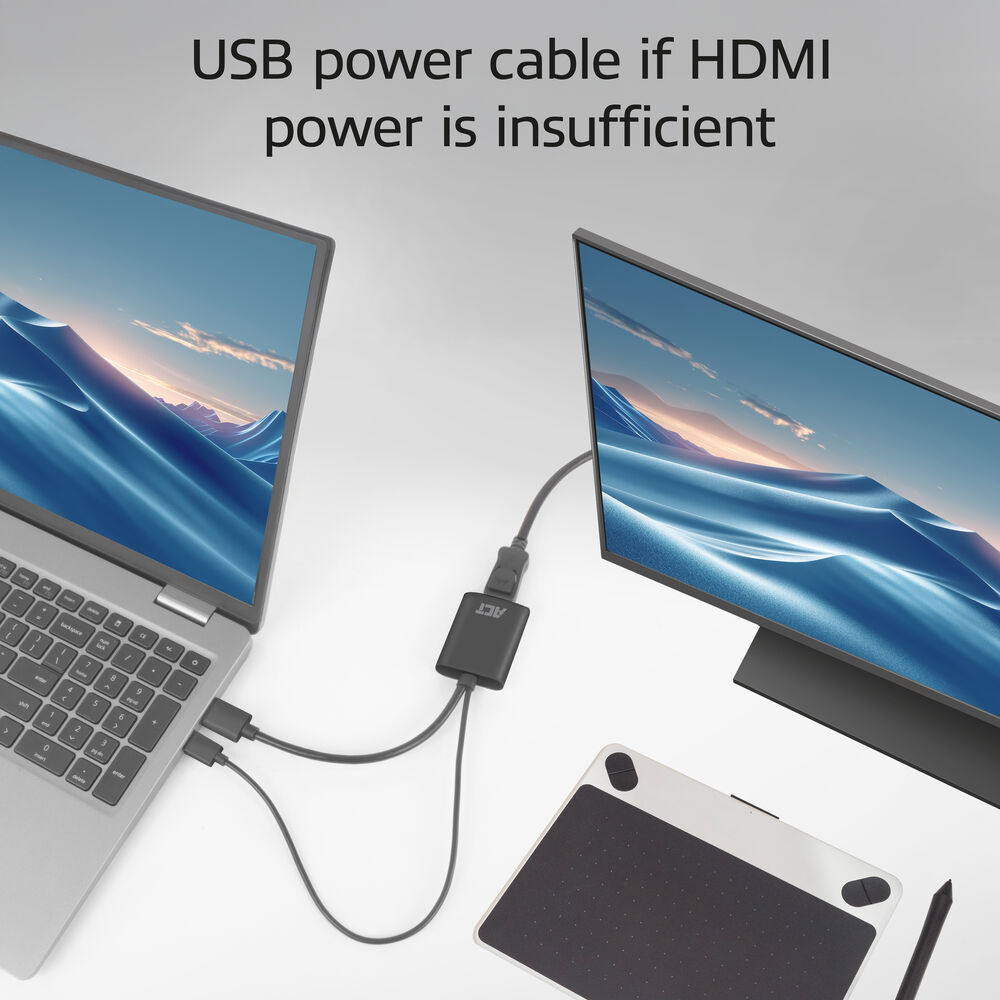 Un portátil conectado a un monitor y una tableta gráfica, con el texto 'Cable de alimentación USB si la alimentación HDMI es insuficiente'.