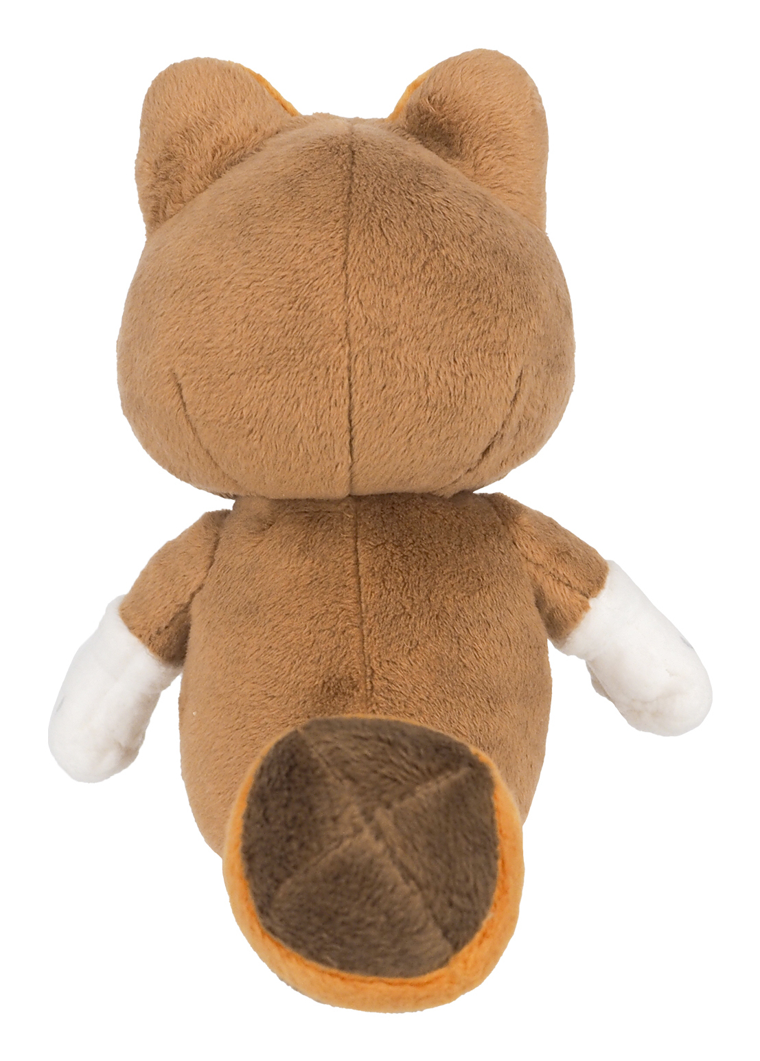 Tył brązowej pluszowej zabawki lisa z białymi łapkami i końcówką ogona. Białe tło.