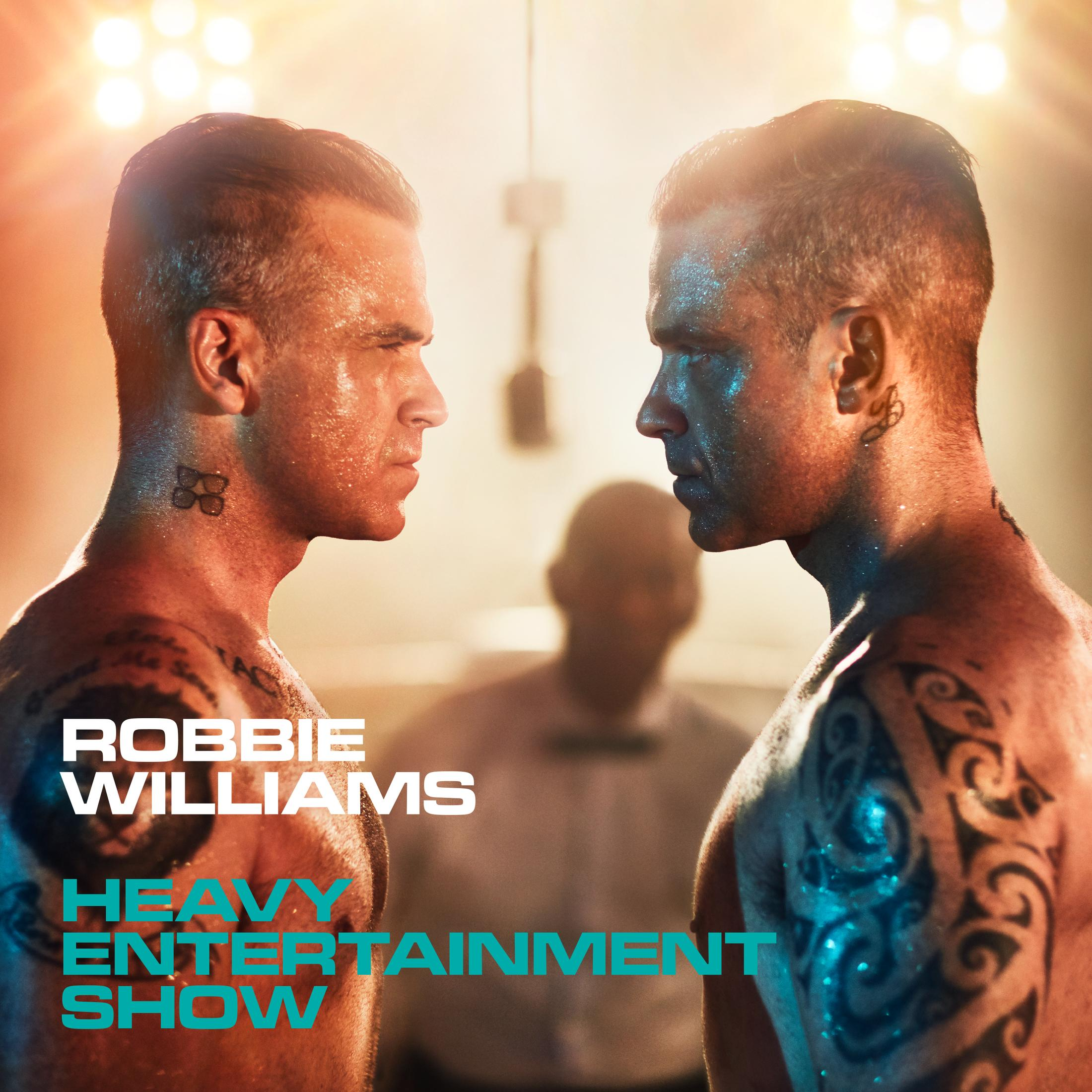 Deux hommes se font face. Le titre dit Robbie Williams, Heavy Entertainment Show. Tatouages visibles.