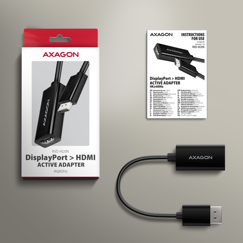 Czarny adapter i pudełko. Na pudełku znajduje się rysunek adaptera. Adapter służy do DisplayPort na HDMI.