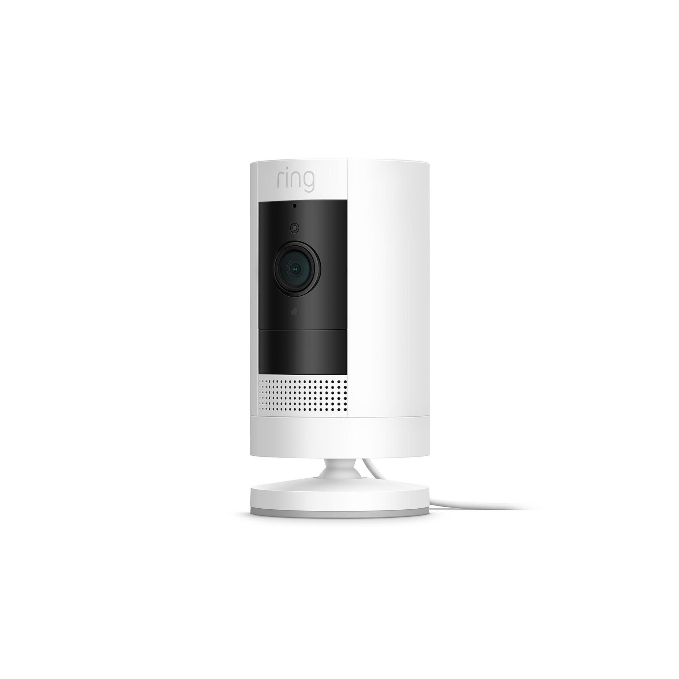 White security camera on a stand.