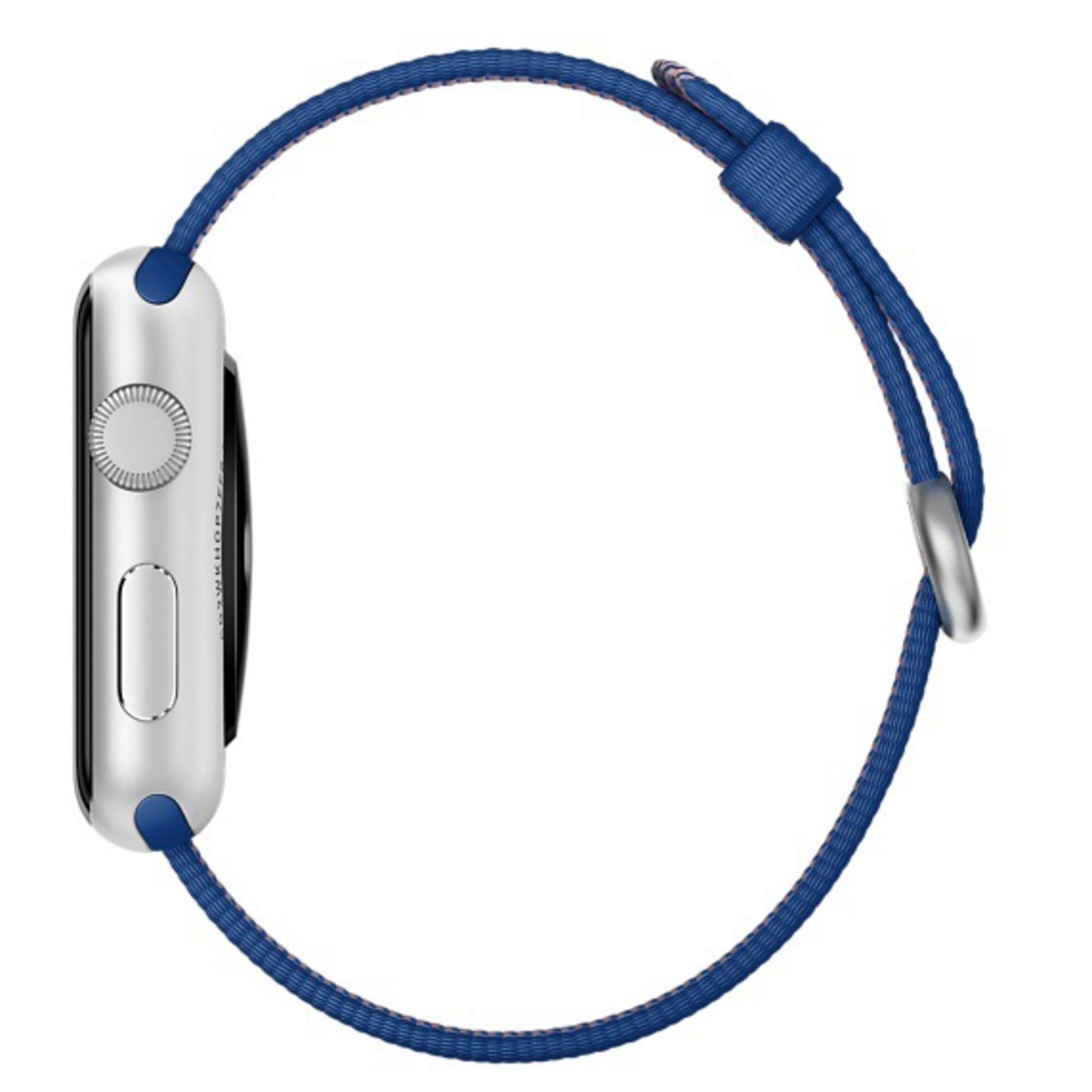 Apple Watch z niebieskim paskiem z tkaniny, widok z boku, pokazujący bok zegarka.