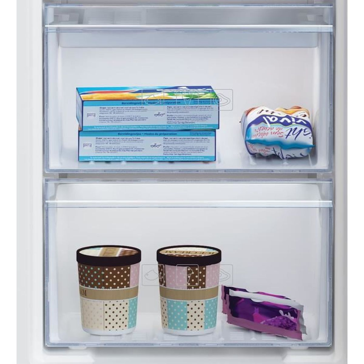 Un congelatore con due cassetti. Il cassetto superiore ha gelato e pasti surgelati. Il fondo ha gelato.