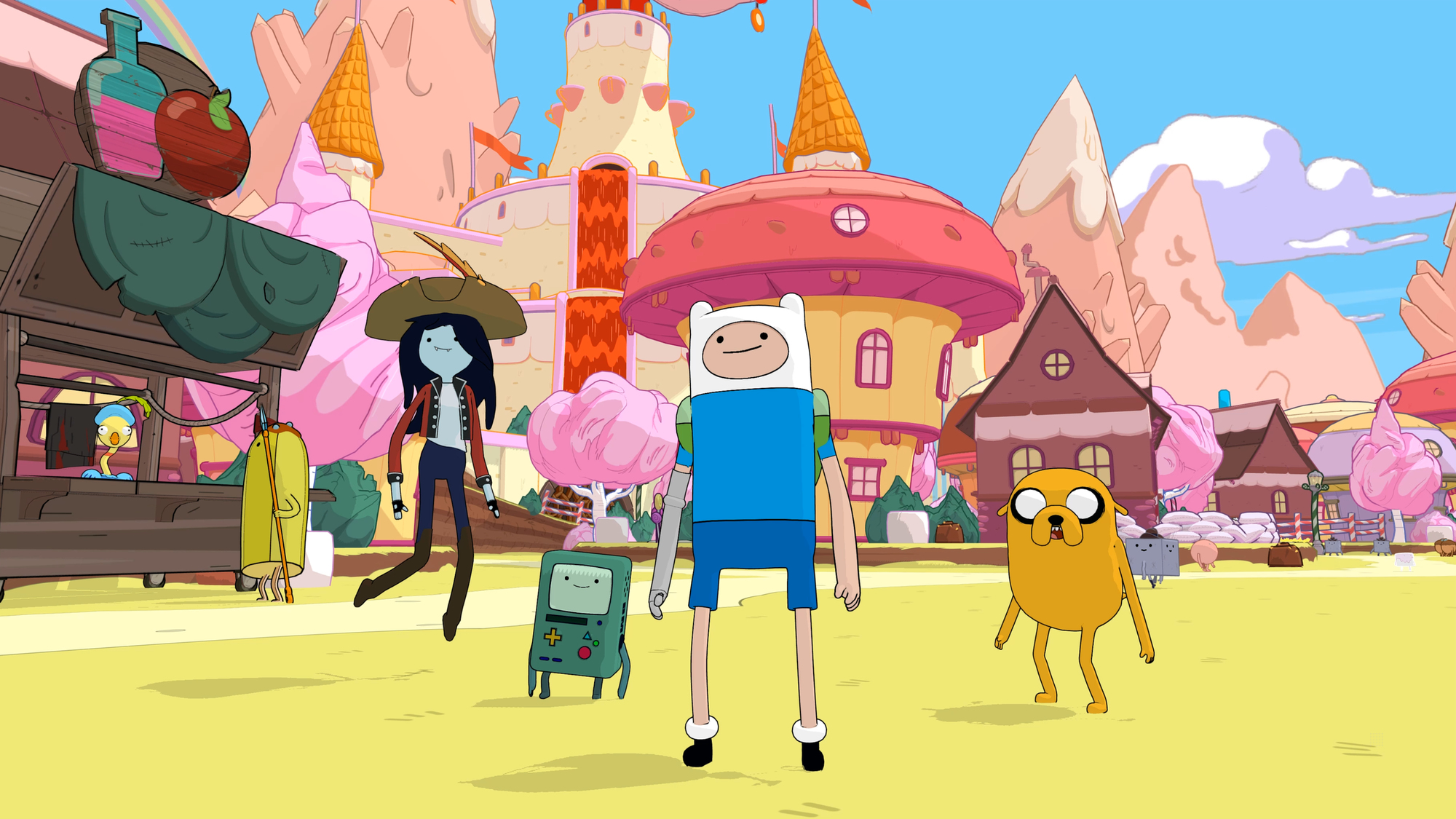 Scena z kreskówki Adventure Time: Finn, Jake, Marceline i BMO w kolorowym, kreskówkowym otoczeniu.