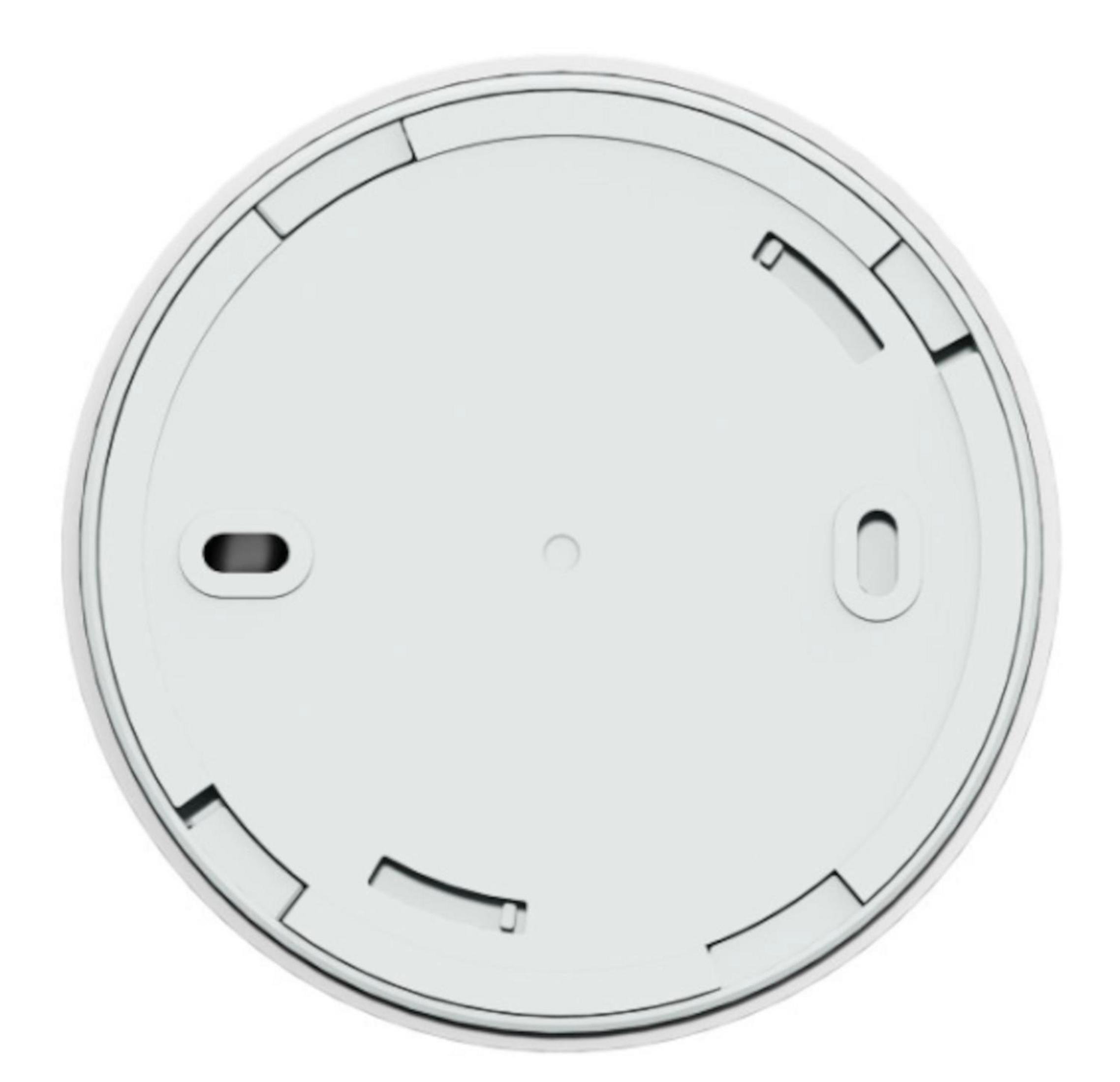 Białe okrągłe urządzenie od spodu z wgłębieniami i otworem pośrodku.