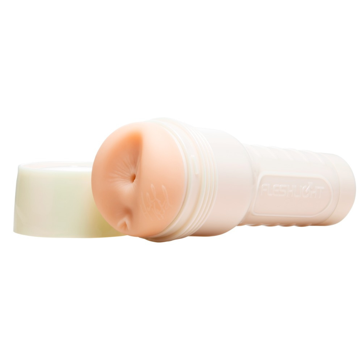 Weißes Fleshlight-Spielzeug, offen, neben einem Deckel, auf weißem Hintergrund.