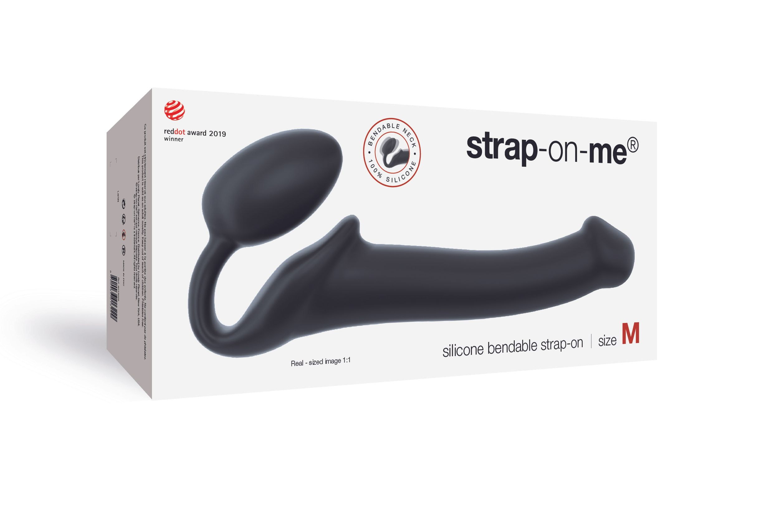Pudełko z czarną zabawką erotyczną, tekst 'strap-on-me' i 'silicone bendable strap-on'.