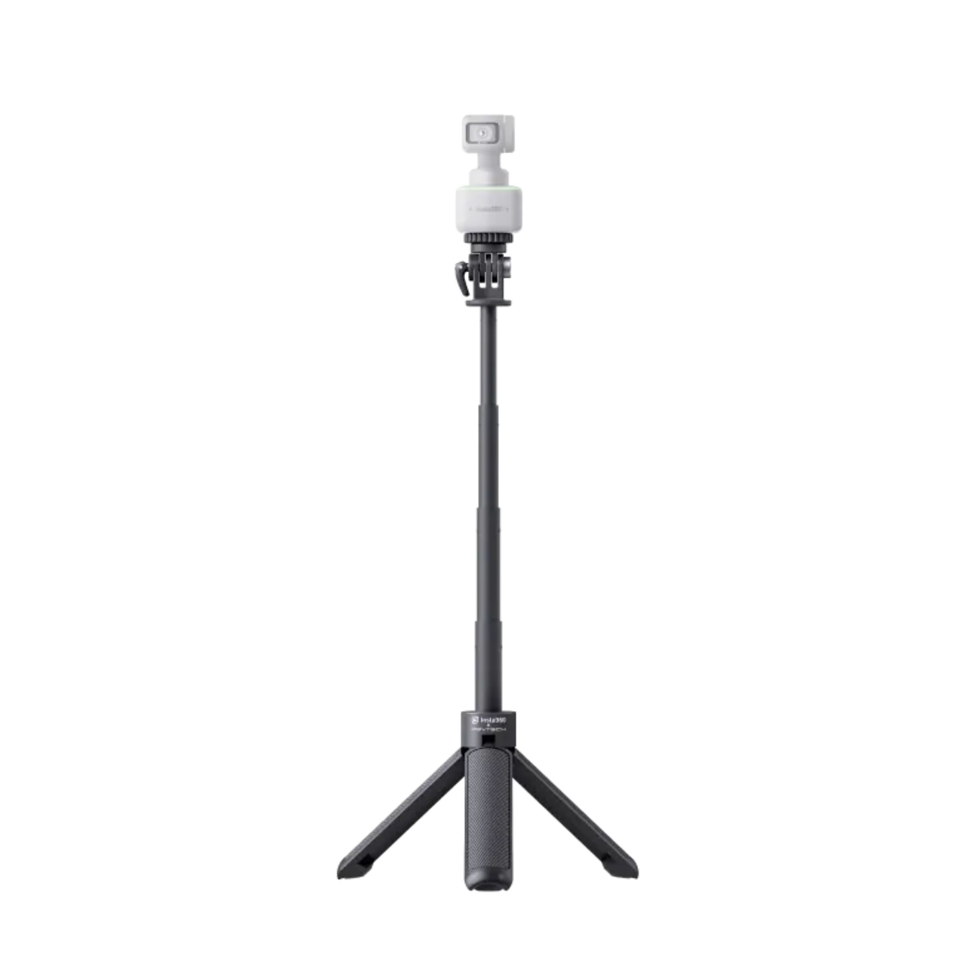 Trípode negro con soporte para teléfono. El trípode está sobre un fondo blanco.