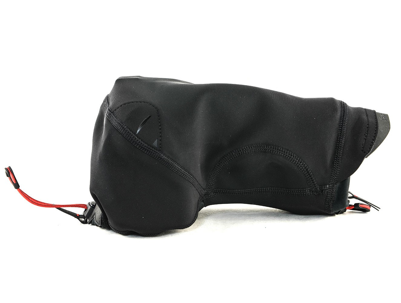 Black camera lens cover, side view, on a white background. Red cord is visible.