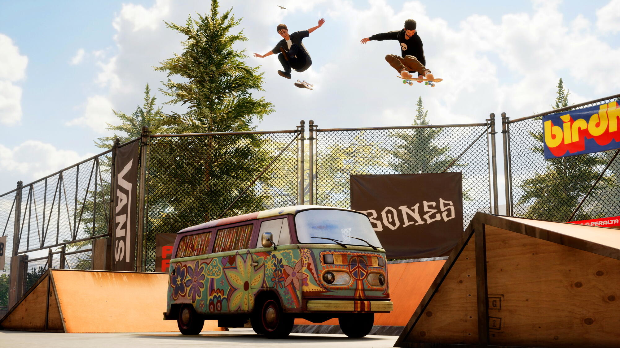Dwóch skaterów w powietrzu nad rampami i vanem VW. Scena z skateparku.