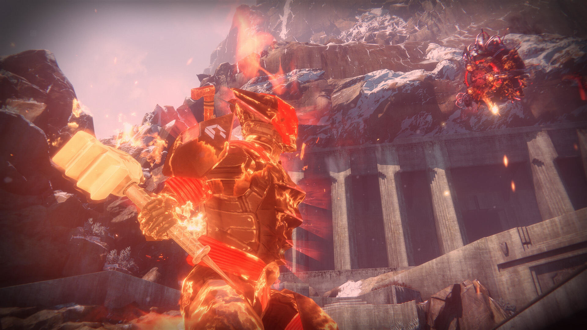 Scena z gry z wojownikiem w płomiennej zbroi, trzymającym młot, z ognistym potworem.