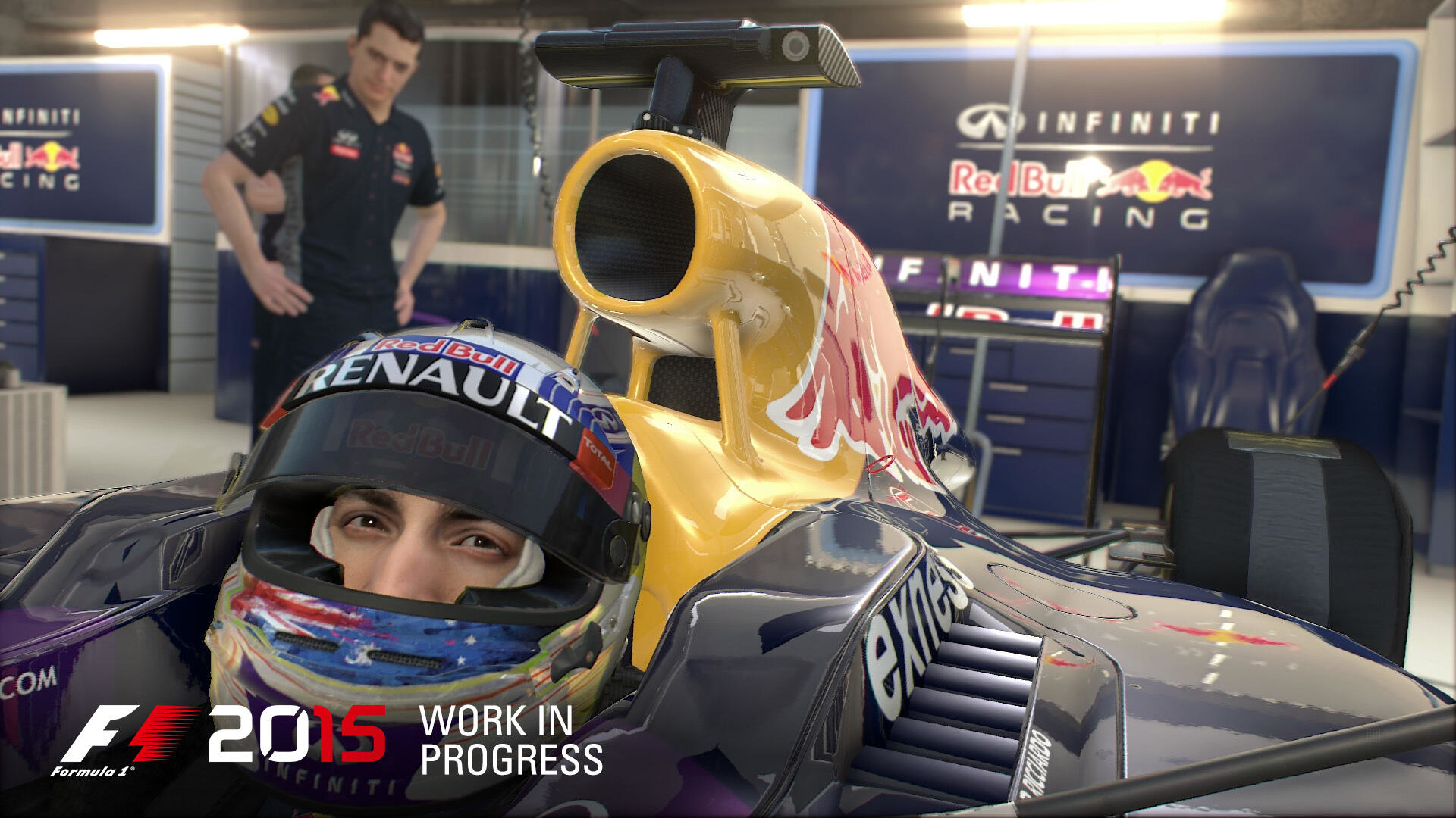 F1 2015 Spiel: Ein Fahrer in einem Rennwagen in einer Garage, 'Work in Progress'.
