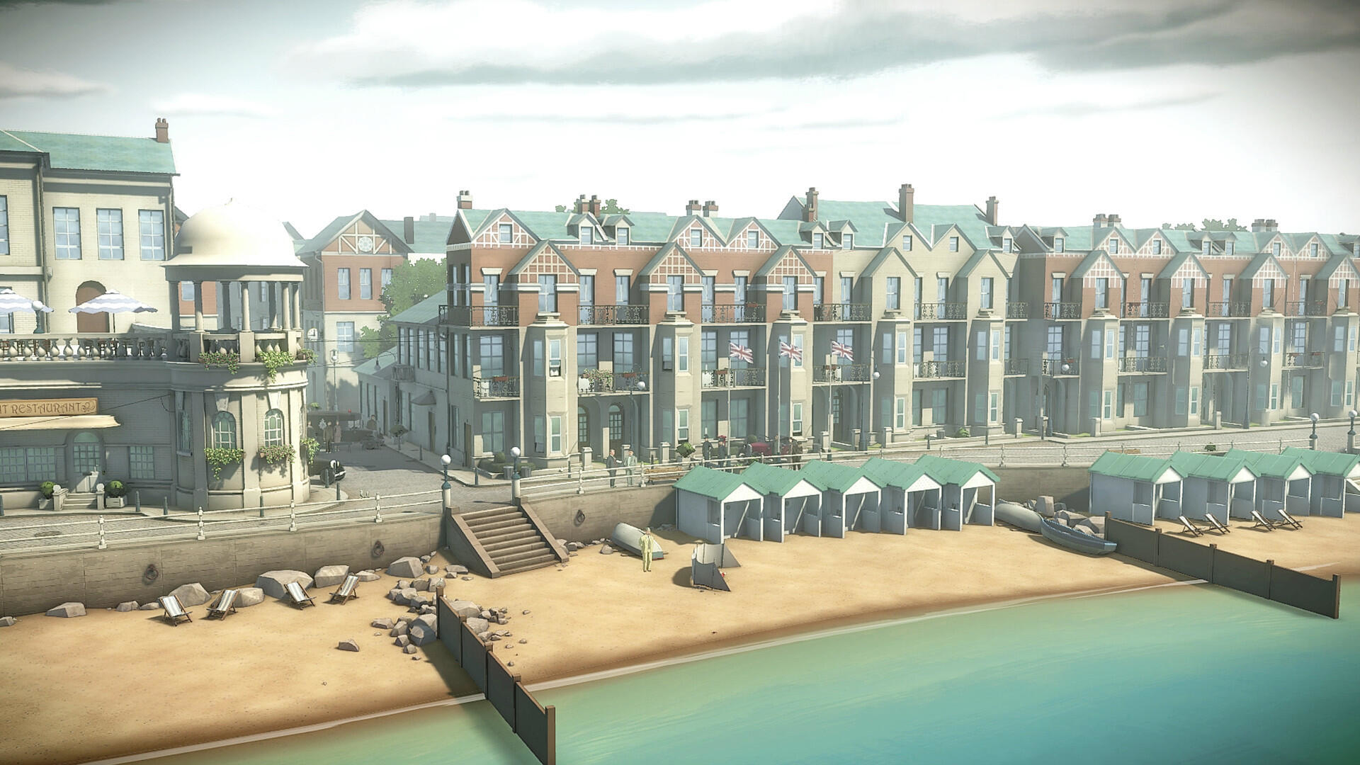 Scena nadmorska z kolorowymi budynkami, domkami na plaży i spokojnym morzem. Słoneczny dzień.