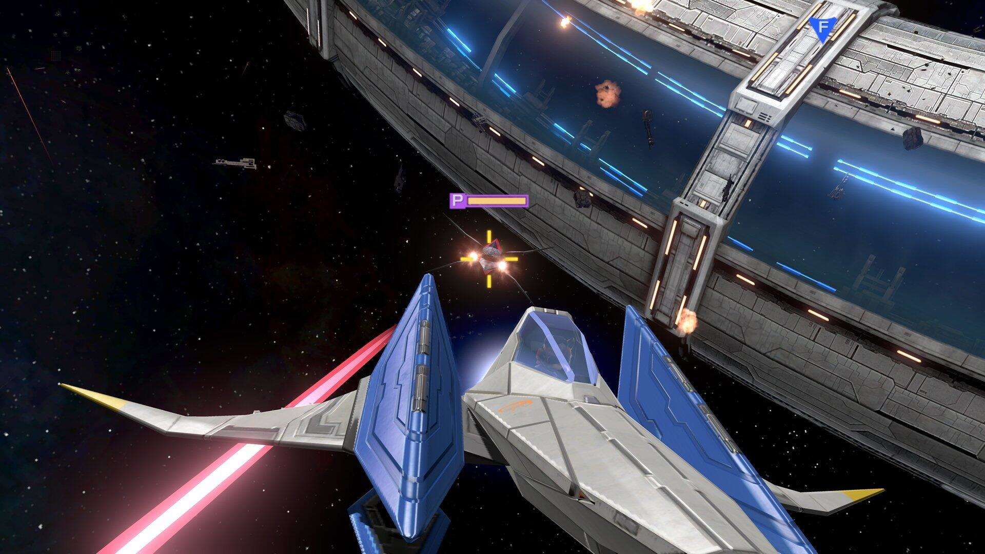 Star Fox Spielszene im Weltraum mit Raumschiff, Raumstation und Text.