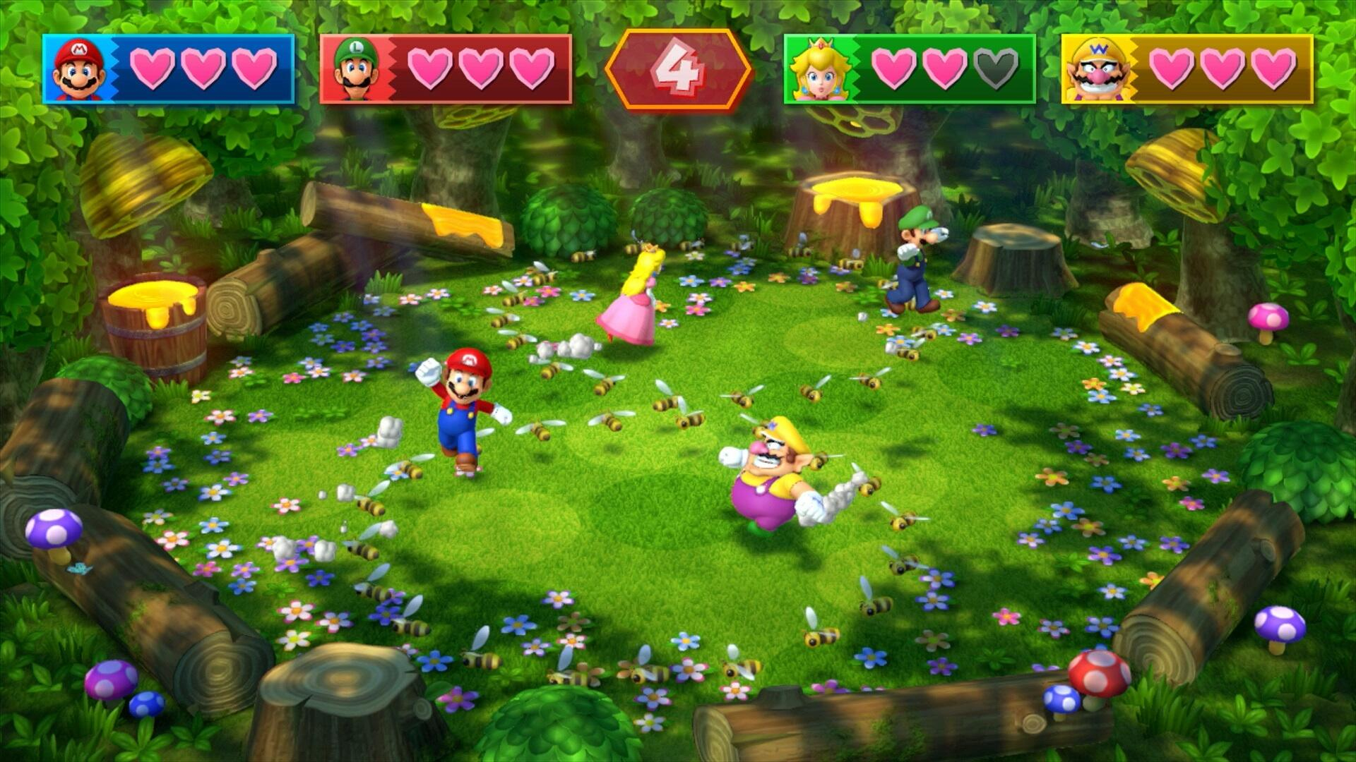Mario Party Spiel: Mario, Peach, Wario und Luigi in einer Waldumgebung. Bienen und Baumstämme sind sichtbar.