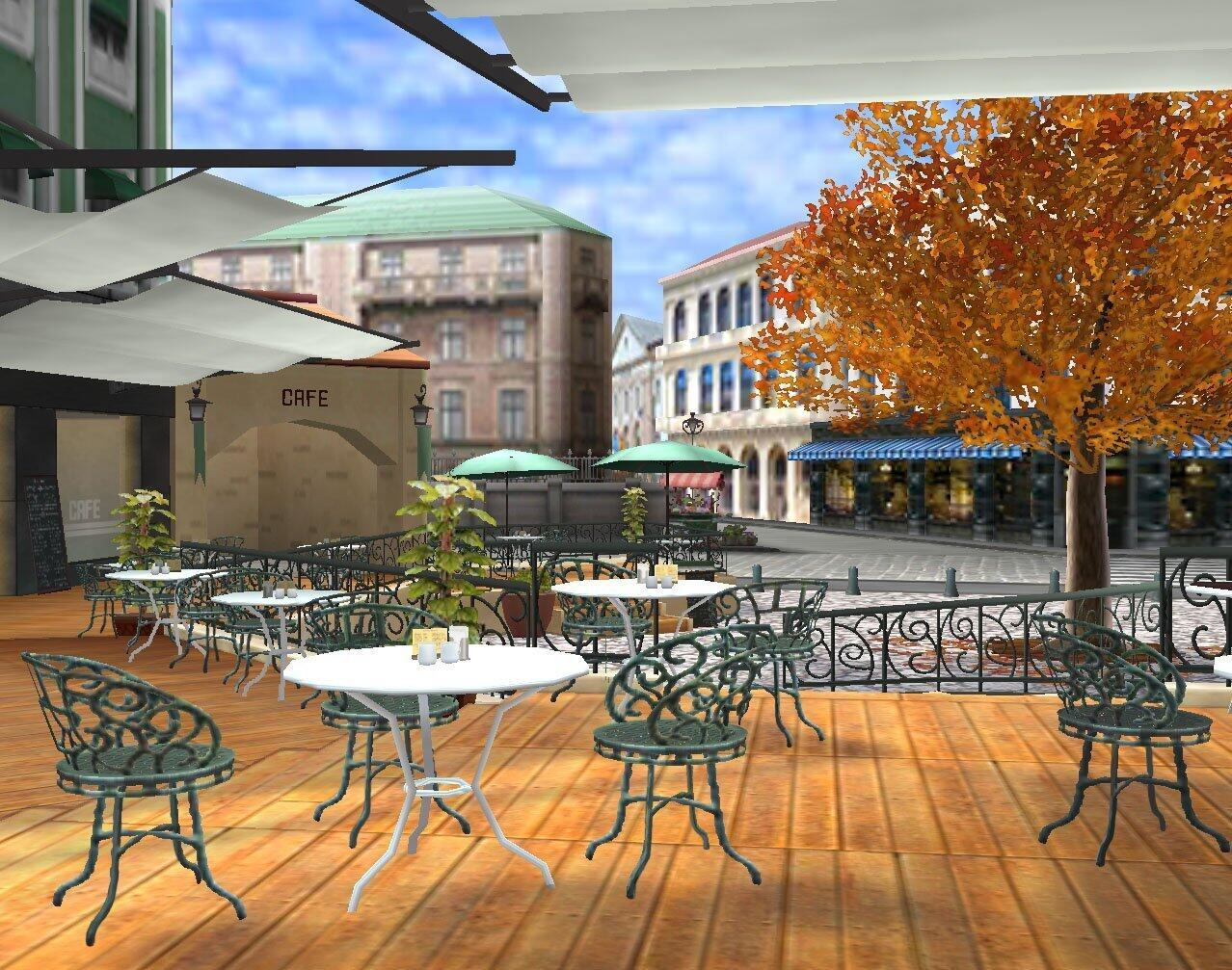 Kawiarnia w słoneczny dzień. Stoły i krzesła są na zewnątrz. Budynki i drzewo w tle.