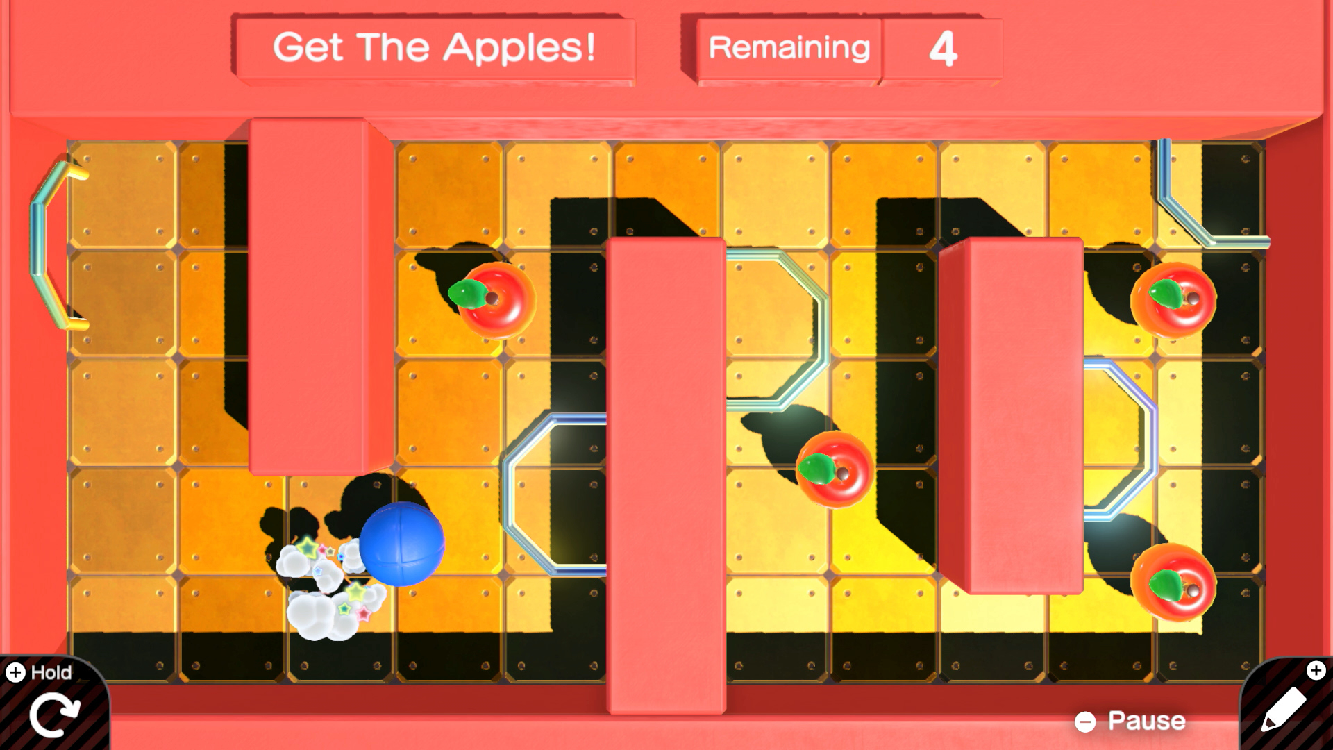 Scena gry: jabłka i niebieska piłka w czerwonym pudełku z przeszkodami.