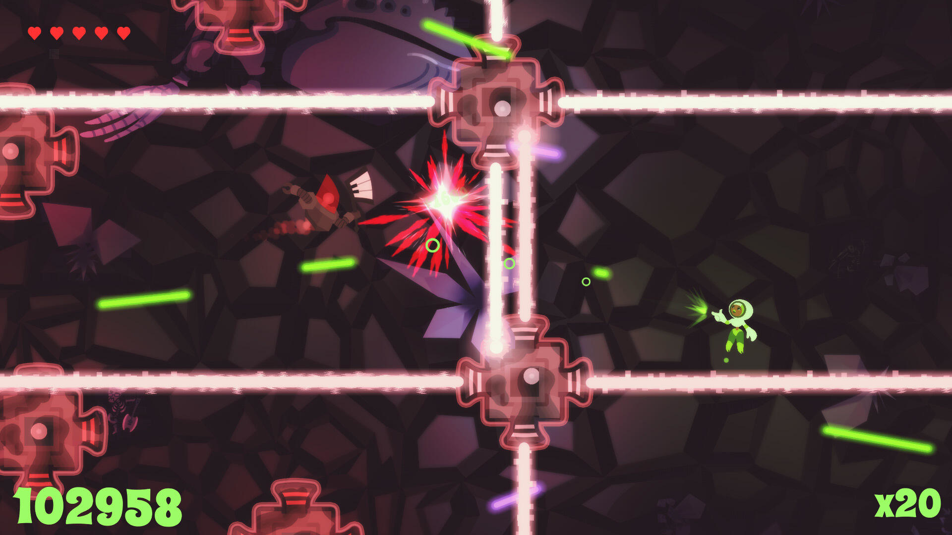 Escena del juego con láseres disparando desde una estructura central; un personaje verde está disparando.