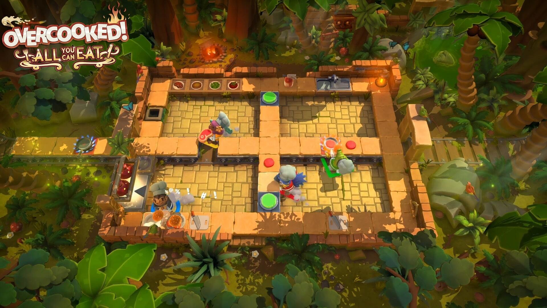Widok z góry na kuchnię z gry Overcooked!. Szefowie kuchni w akcji, kuchnia wyłożona kafelkami.