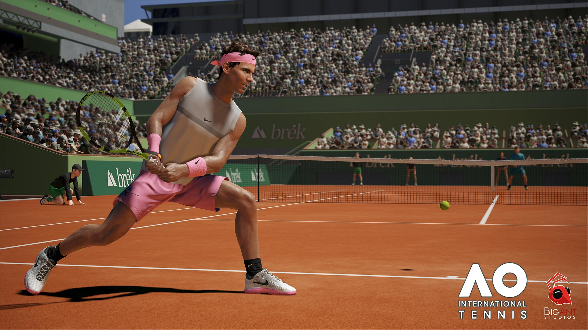 Ein Tennisspieler schlägt den Ball auf einem Platz.