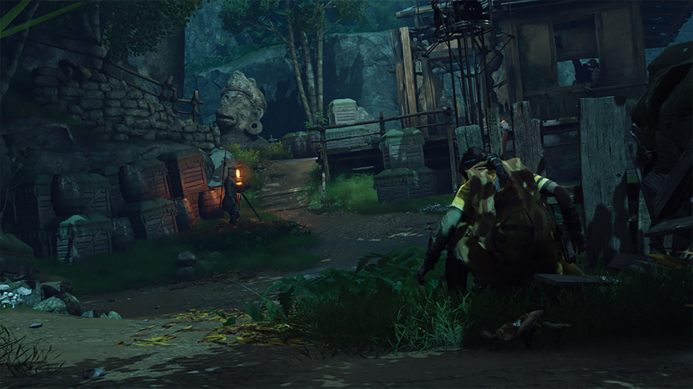 Scena z postacią kucającą w mrocznym leśnym otoczeniu.