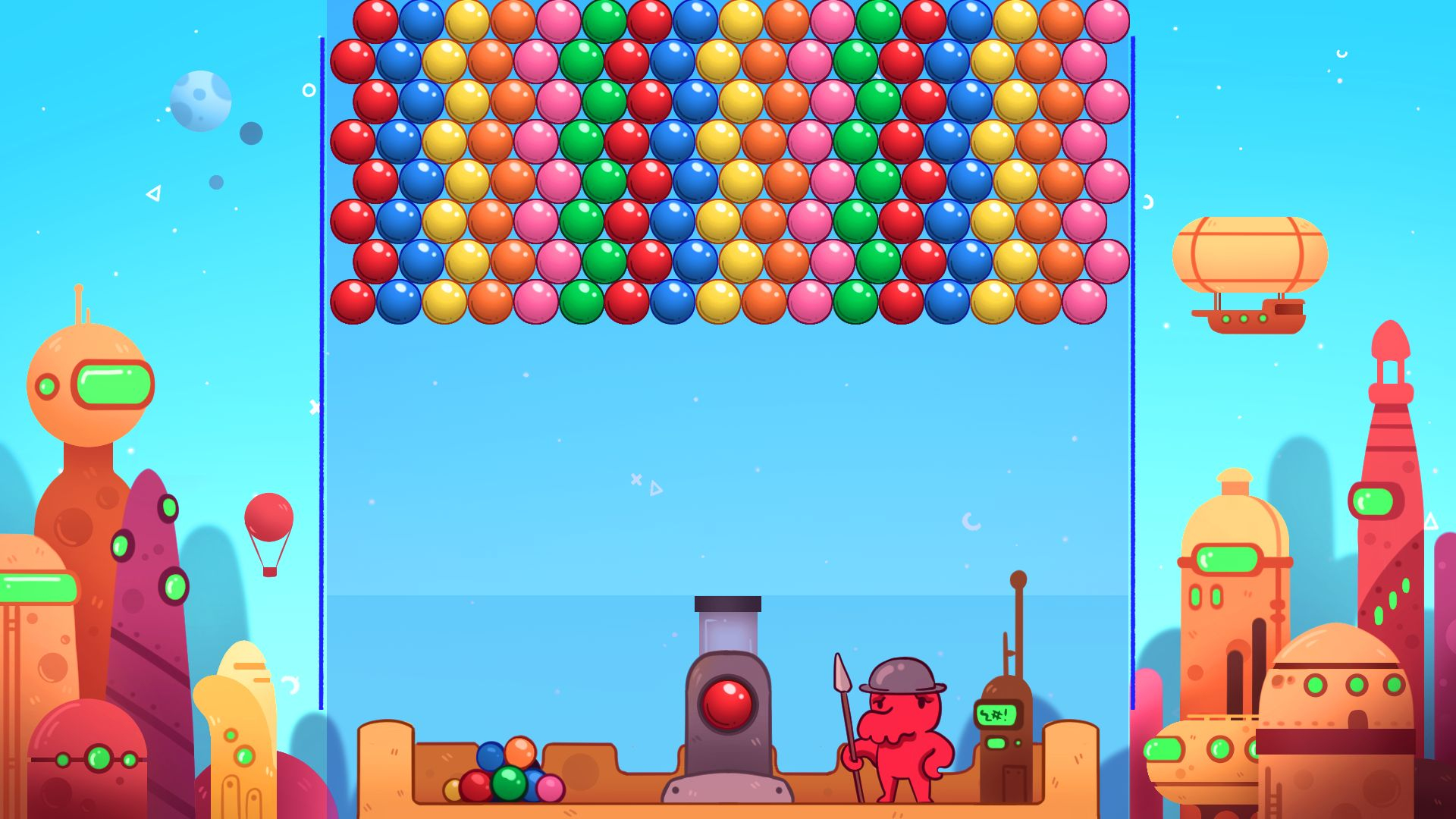 Una escena de juego con burbujas, un personaje rojo y edificios de ciencia ficción. Fondo de cielo azul.