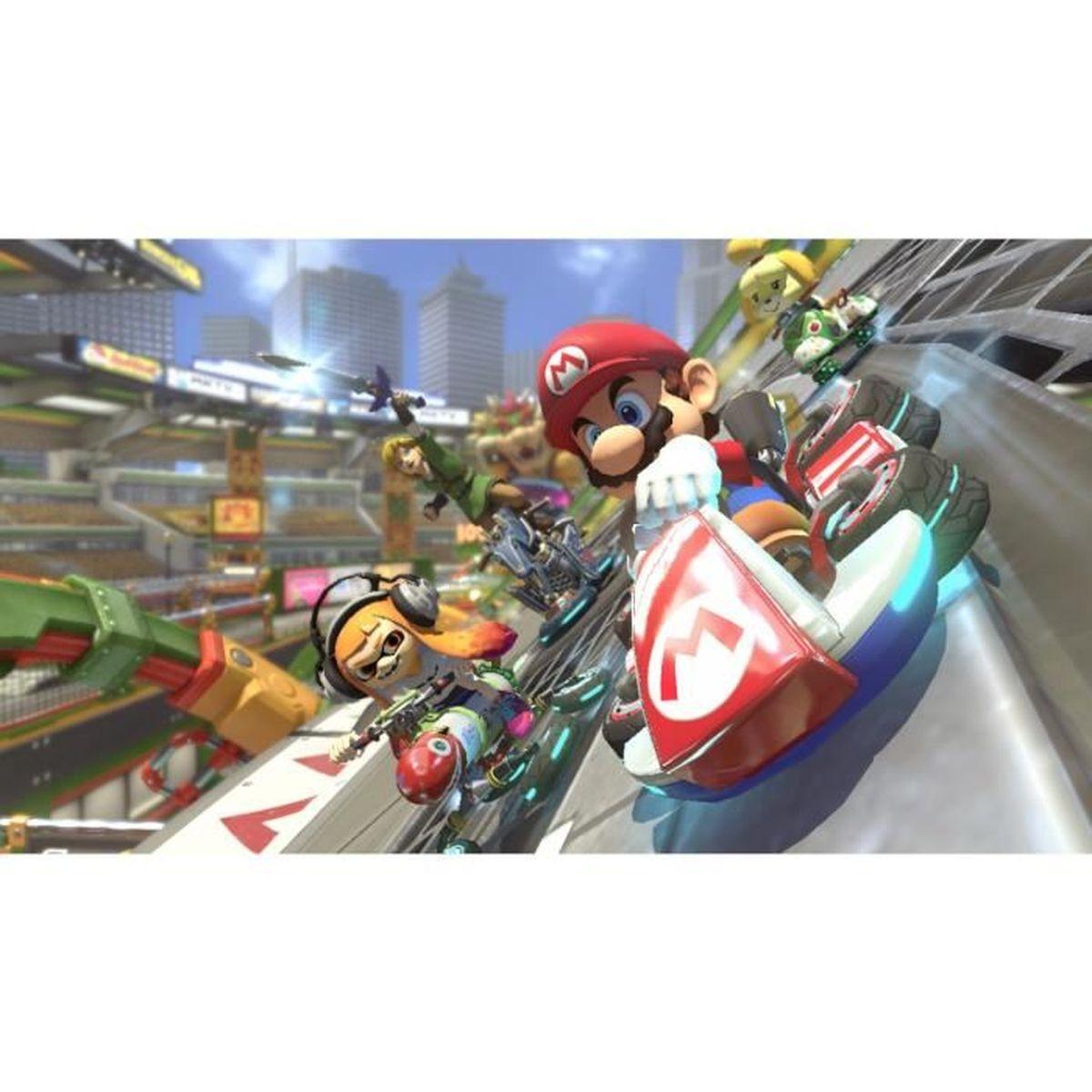 Scena z gry Mario Kart z Mario w wyścigu. Postacie ścigają się gokartami w kolorowym otoczeniu.