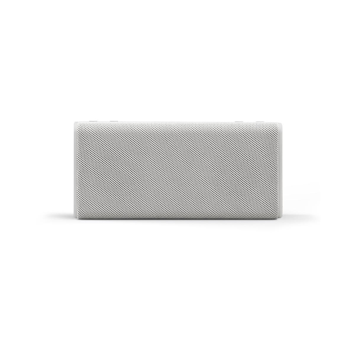 Un altoparlante rettangolare bianco su sfondo bianco, design semplice e minimalista.