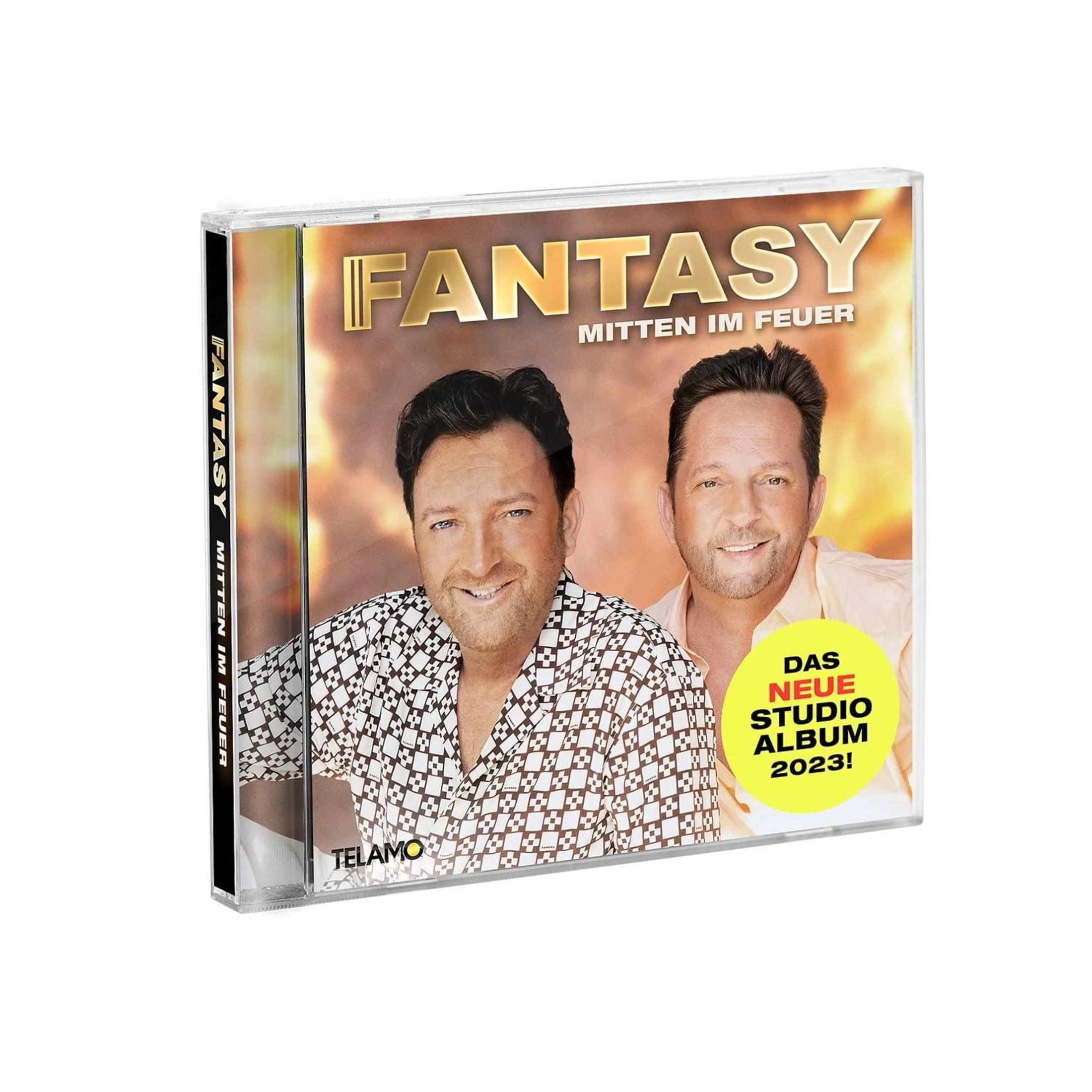 CD-Cover mit zwei lächelnden Männern. Titel: Fantasy, Mitten im Feuer. Text: Das neue Studio Album 2023!