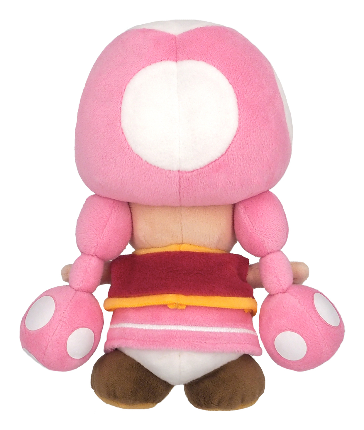 Un peluche di Toad di Super Mario. Ha una testa rosa, braccia rosa e un gilet rosso.