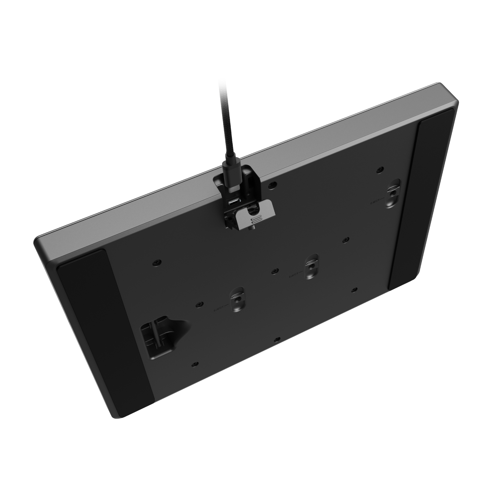 Spód czarnego kontrolera do gier z portem ładowania i gumowymi nóżkami.