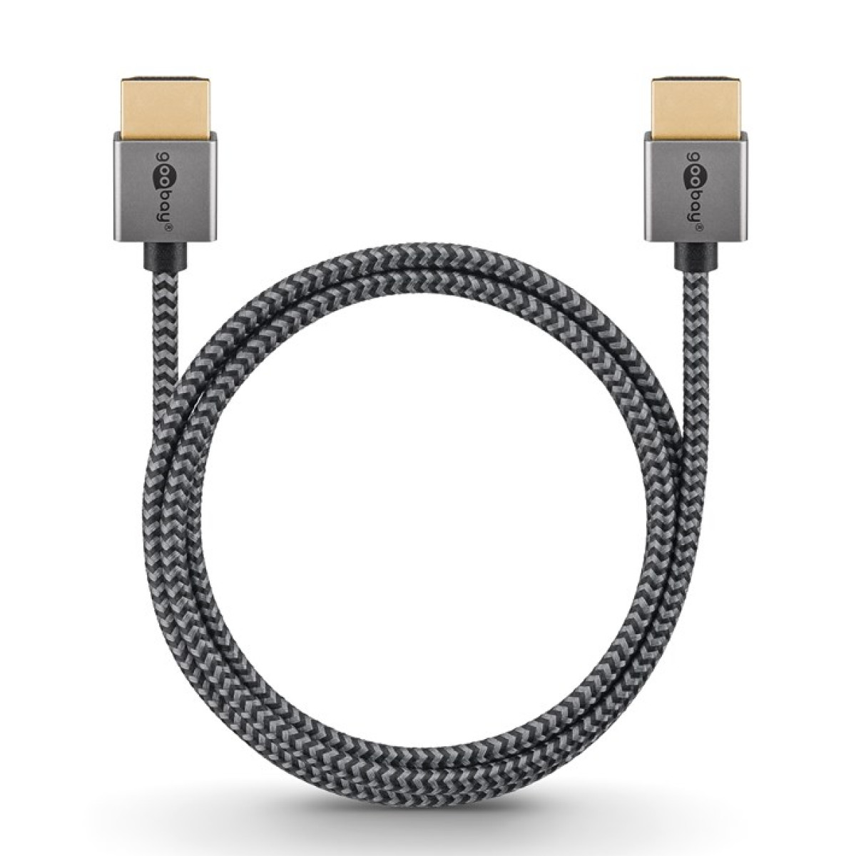 Een HDMI-kabel in een cirkel. Zilveren connectoren zitten aan elk uiteinde, met grijs en zwart vlechtwerk.