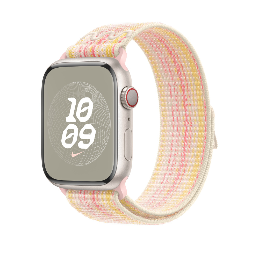 Apple Watch with Nike band, cream and yellow stripes, pink accents. White background.
