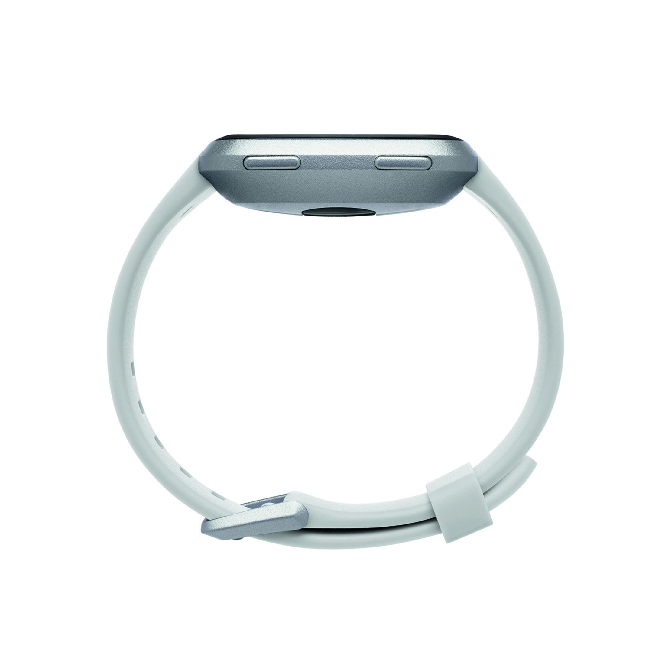 Un reloj inteligente gris con una correa gris claro. El reloj es circular con dos botones.