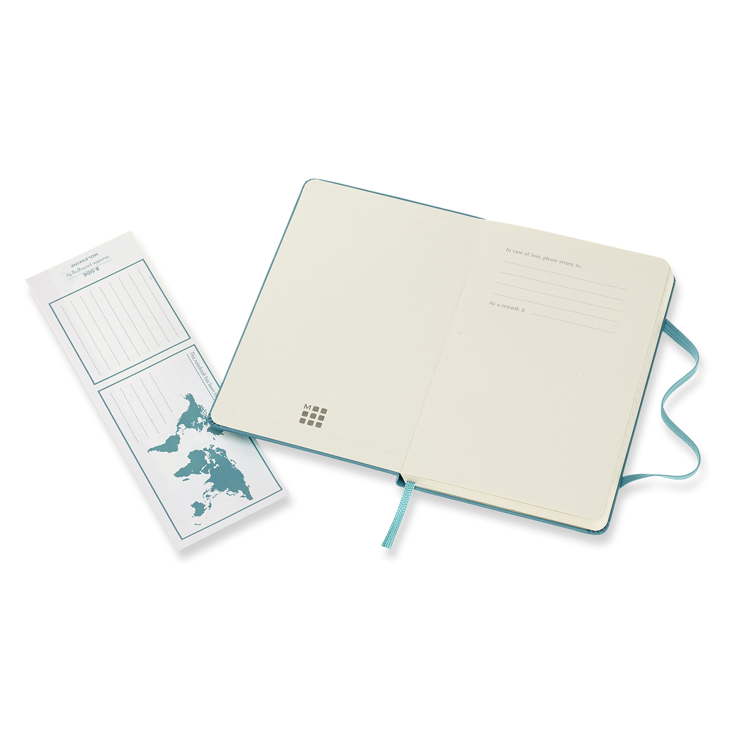 Otwarty notatnik w kolorze morskim z małym notatnikiem i mapą świata.