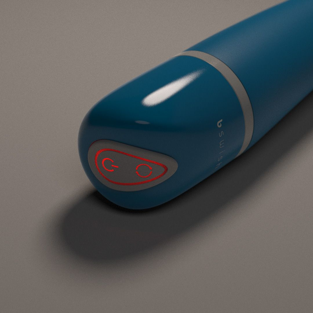 Primer plano del botón de un vibrador azul con iconos de encendido/ciclo rojos encendidos.