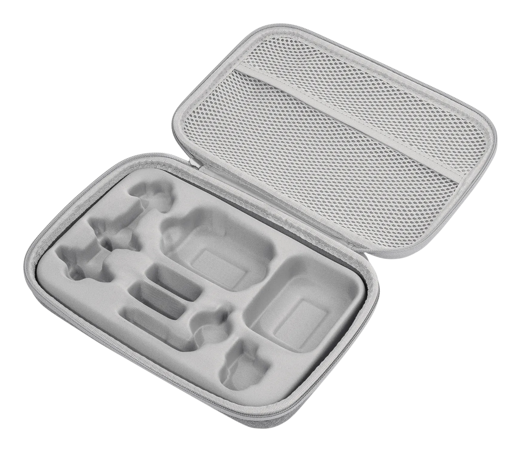 Otwarta szara obudowa z przegródkami na akcesoria.