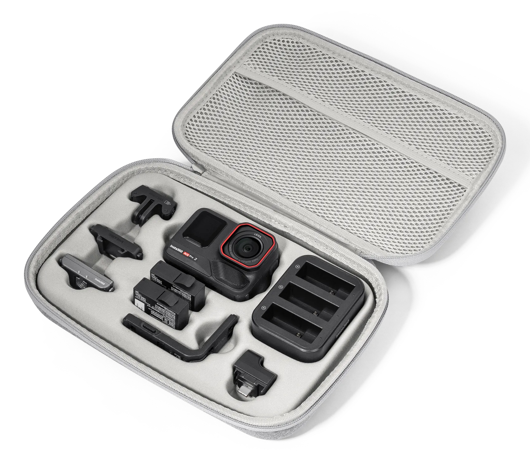 Otwarta szara obudowa z kamerą i akcesoriami.