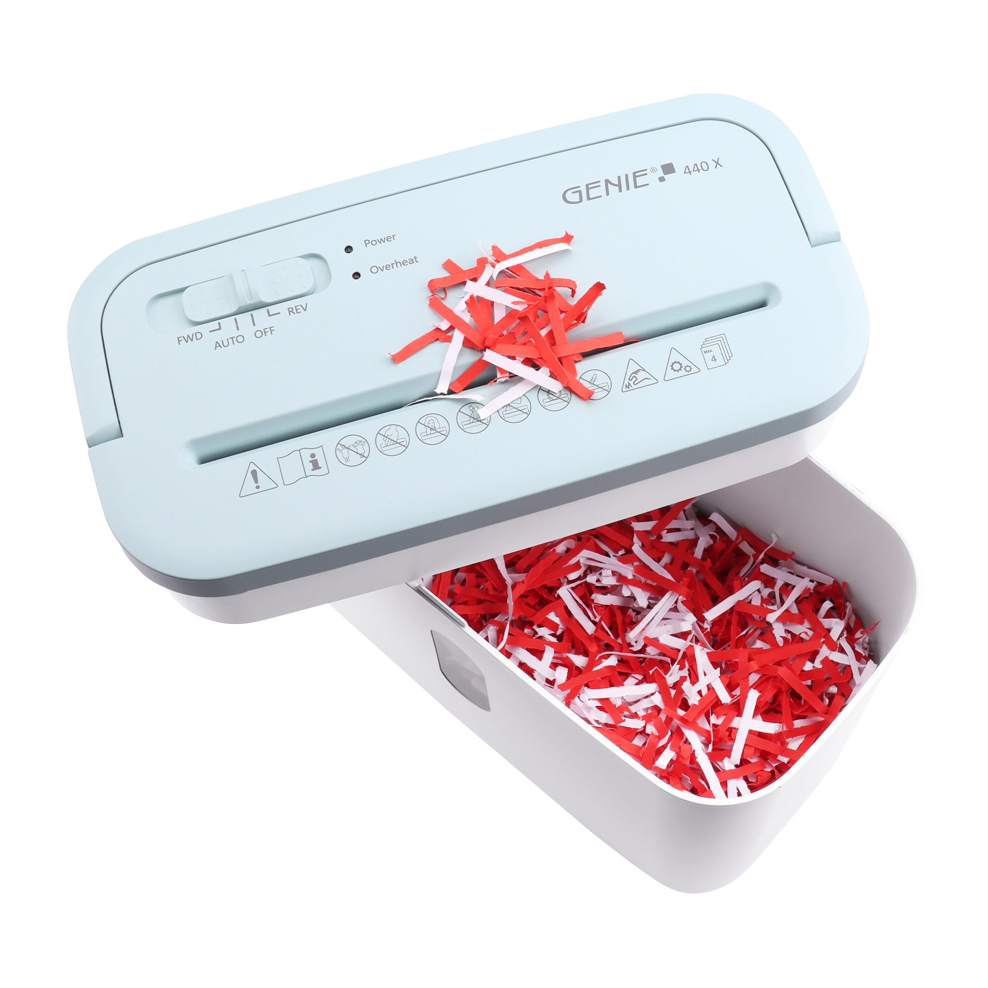 Niszczarka w akcji, tnąca papier na czerwono-białe paski.