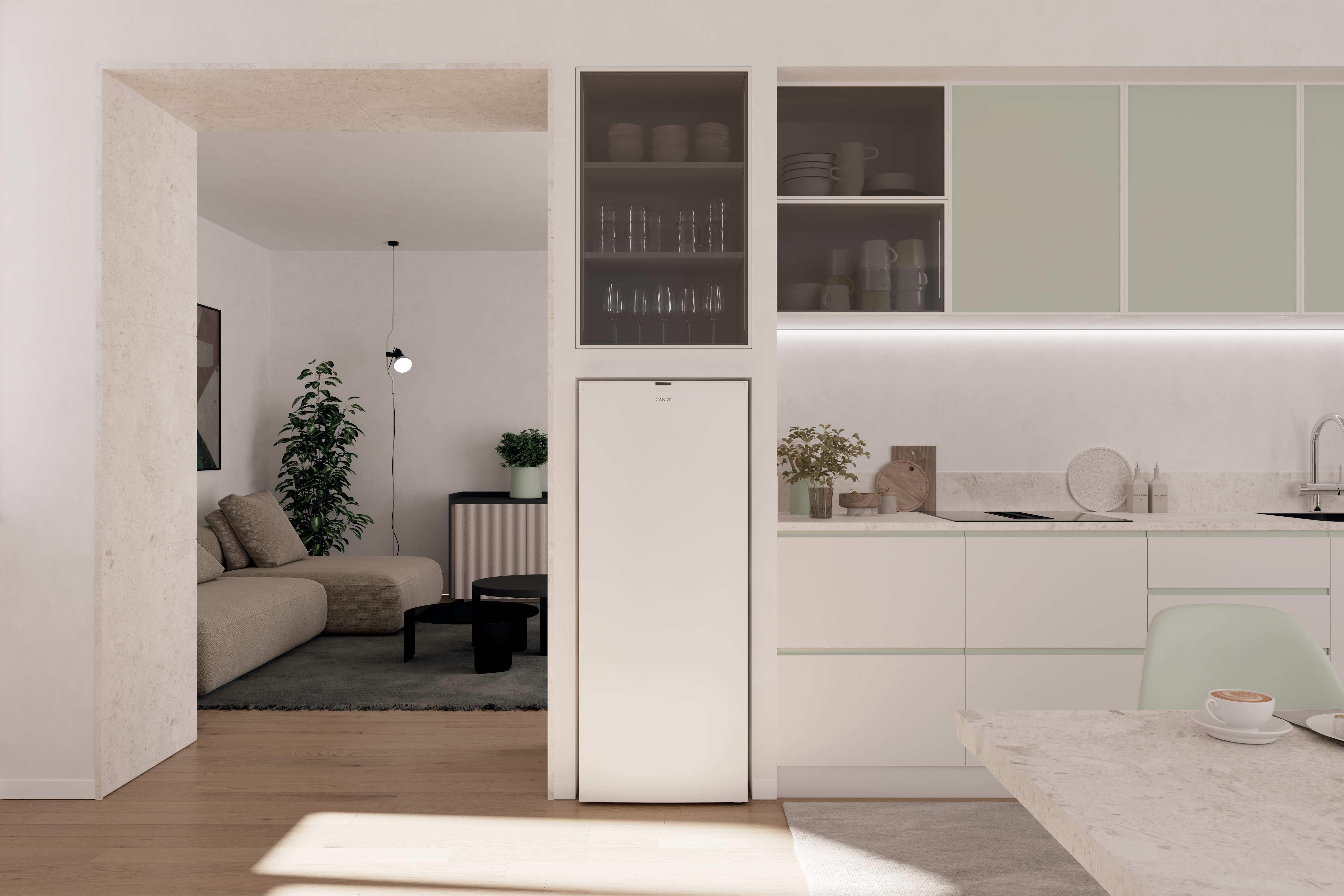 Modern keukeninrichting met witte kasten, een witte koelkast en een houten vloer.