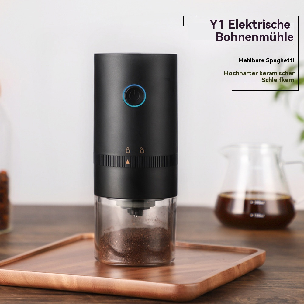Eine schwarze elektrische Kaffeemühle mit Text und einem transparenten Behälter mit Kaffeesatz.