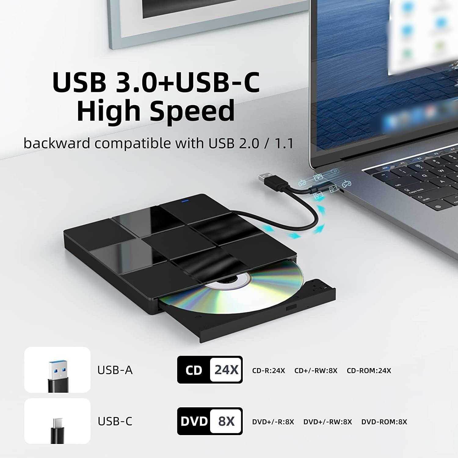 Schwarzes Gerät mit eingelegter CD und USB-Kabel, das an einen Laptop angeschlossen ist. Text oben: USB 3.0+USB-C High Speed.