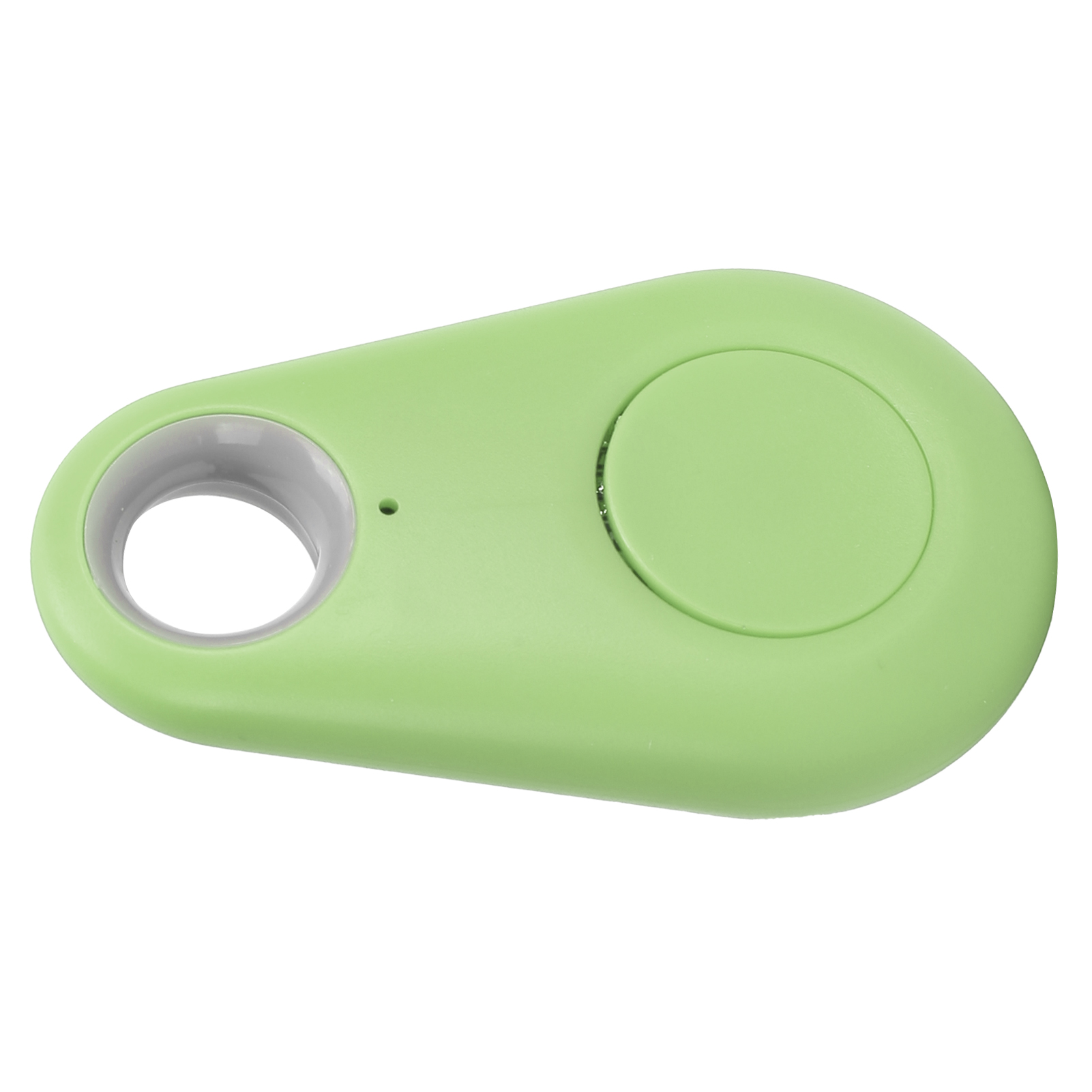 Grüner ovaler Tracker mit Knopf und Loch zur Befestigung, auf weißer Oberfläche.