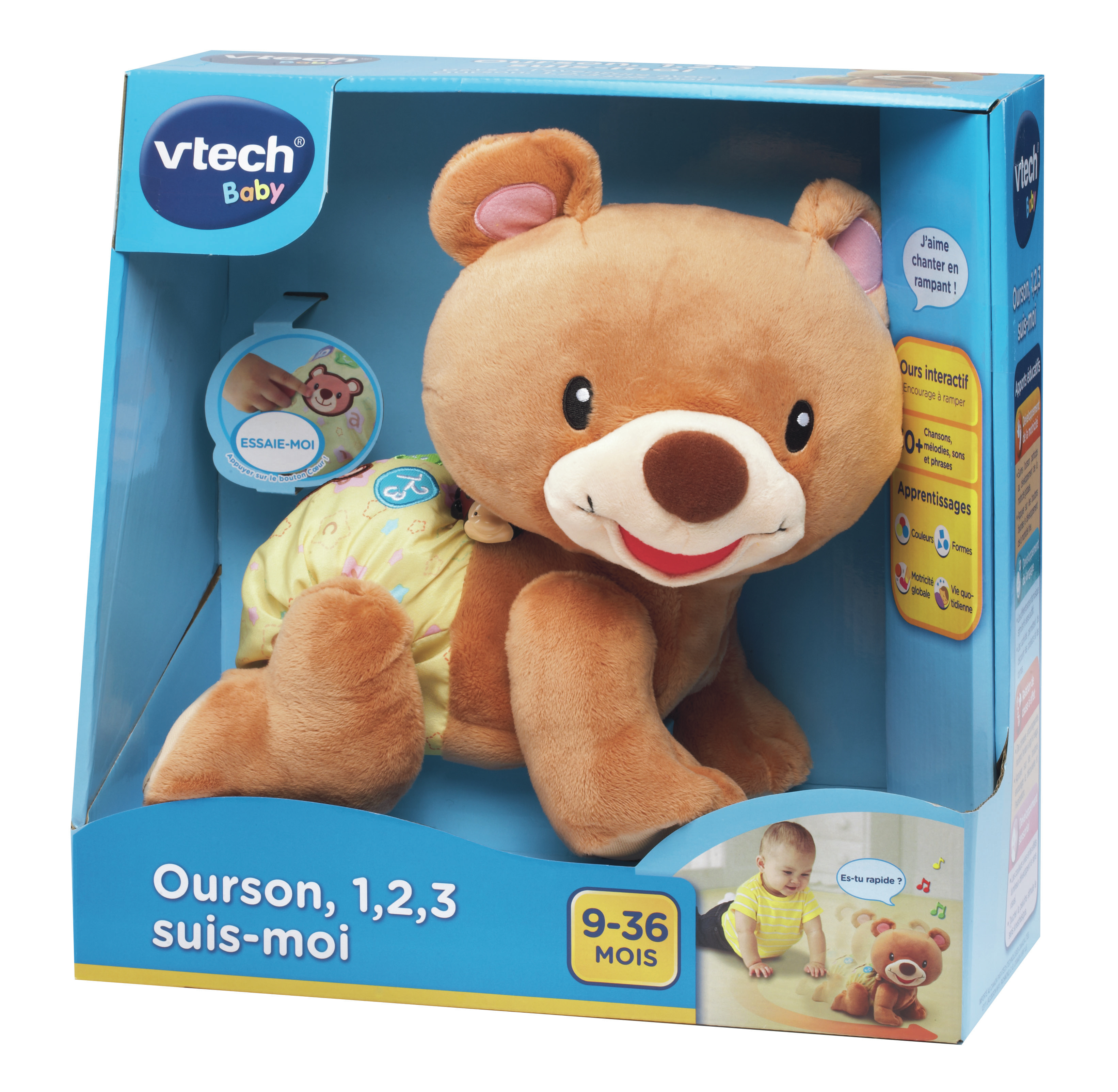 Un oso de peluche marrón en una caja. La caja tiene texto e imágenes sobre el juguete.