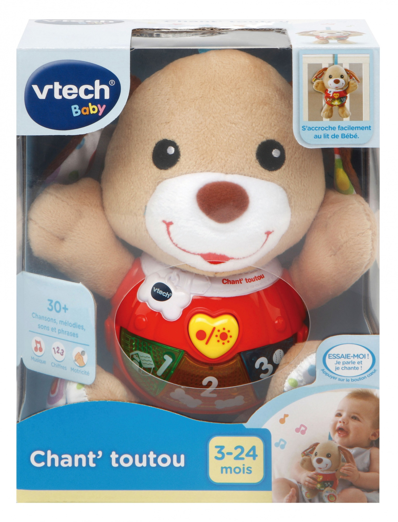 Ein VTech Babyspielzeug, ein Stoffhund in einer Box. Es hat Knöpfe, einen roten Bauch und einen Bildschirm.