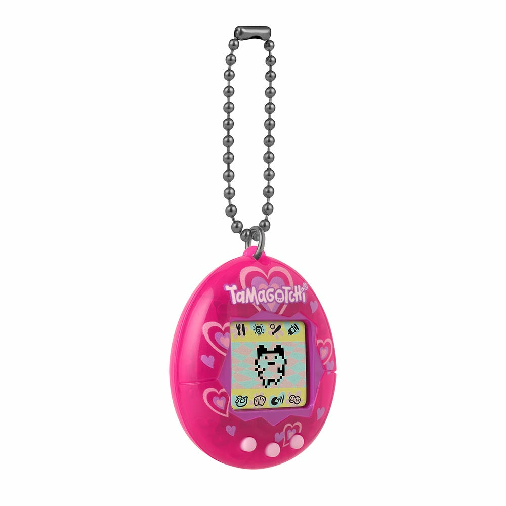 Różowa gra Tamagotchi z ekranem wyświetlającym pikselową postać.