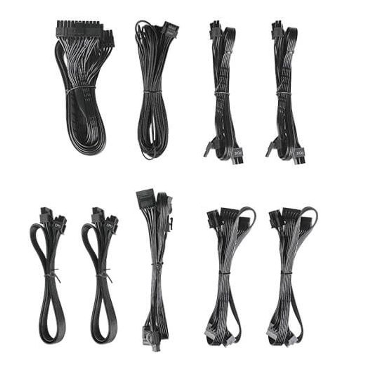 Una colección de cables de computadora negros. Los cables están agrupados y listos para usar.