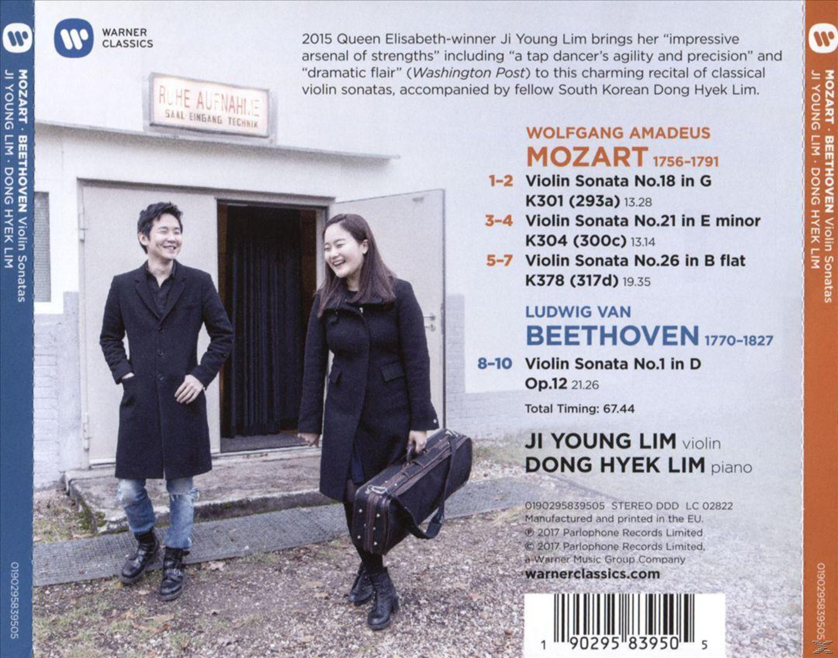 Okładka albumu z dwiema osobami i tekstem o muzyce, kolory biały, niebieski i szary.